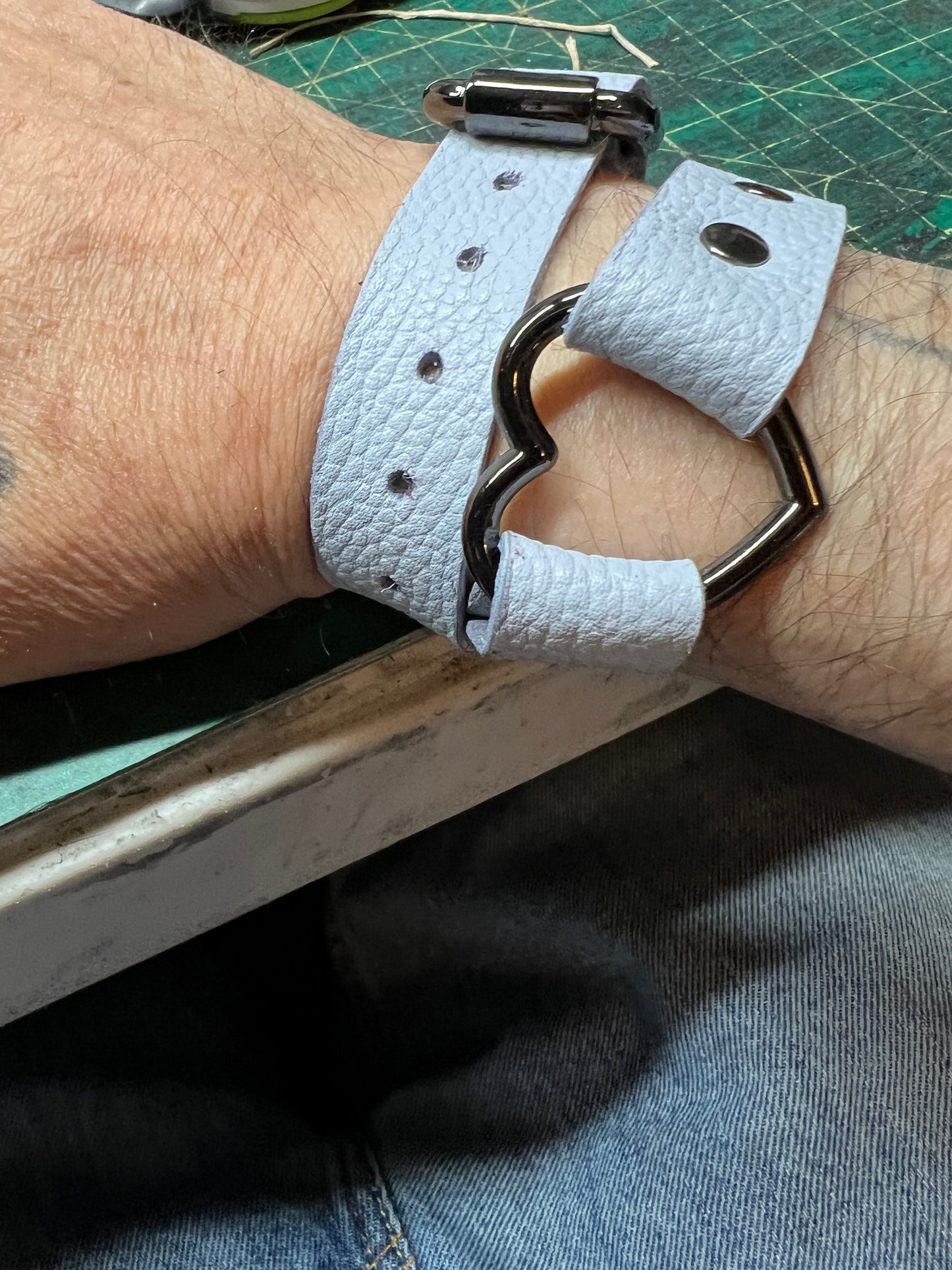 leather mobility limiting cuff. 3/4" wide, 18" long