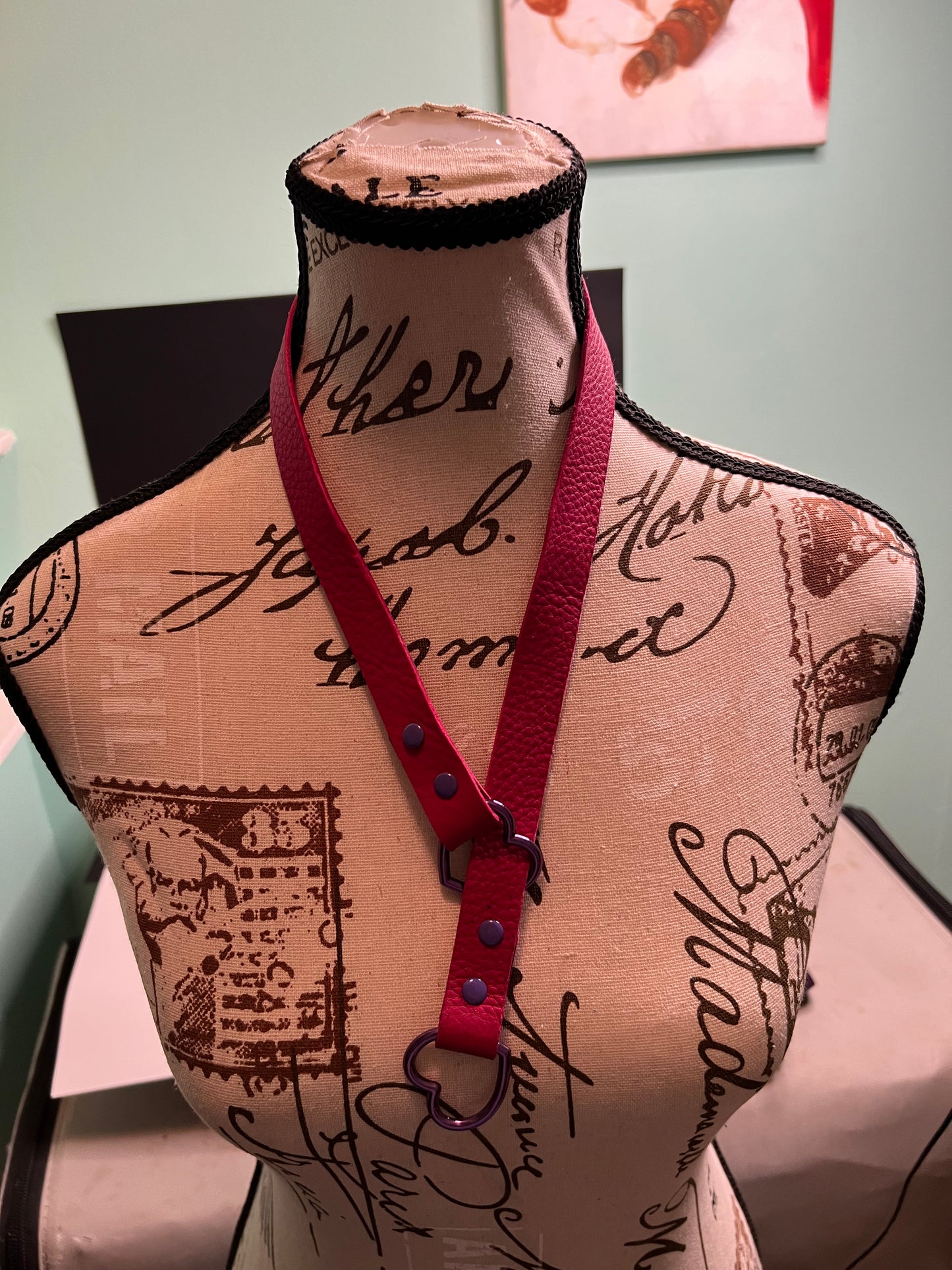 Leather slip choker necklace with hearts.
