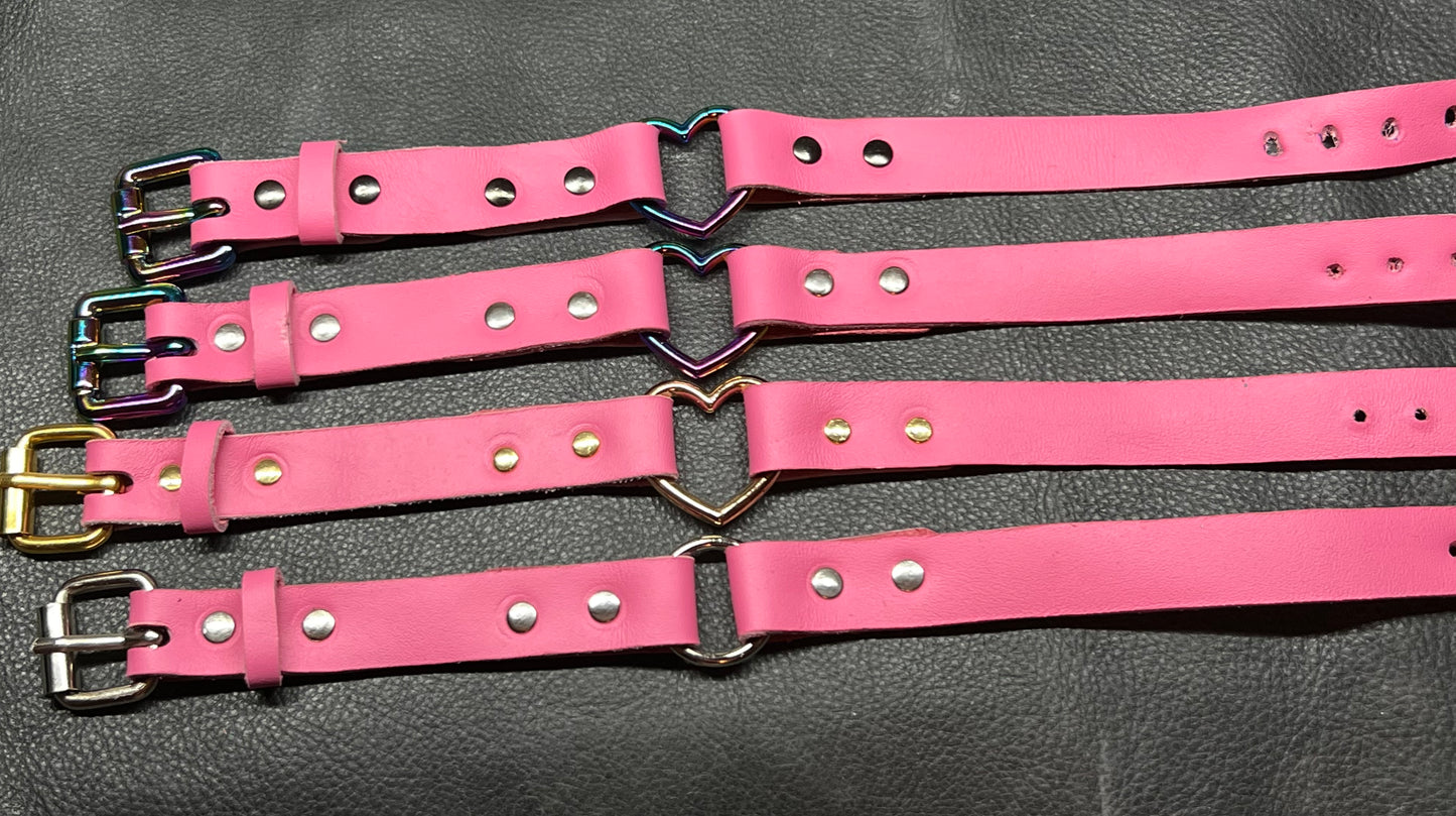 Pink leather restraint bracelets